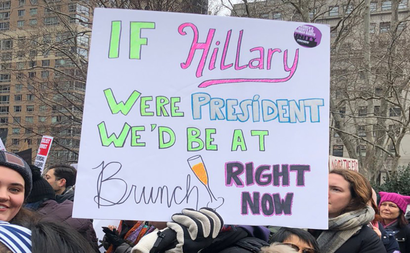 Protest sign that reads "If Hillary were President We'd be at Brunch Right Now"